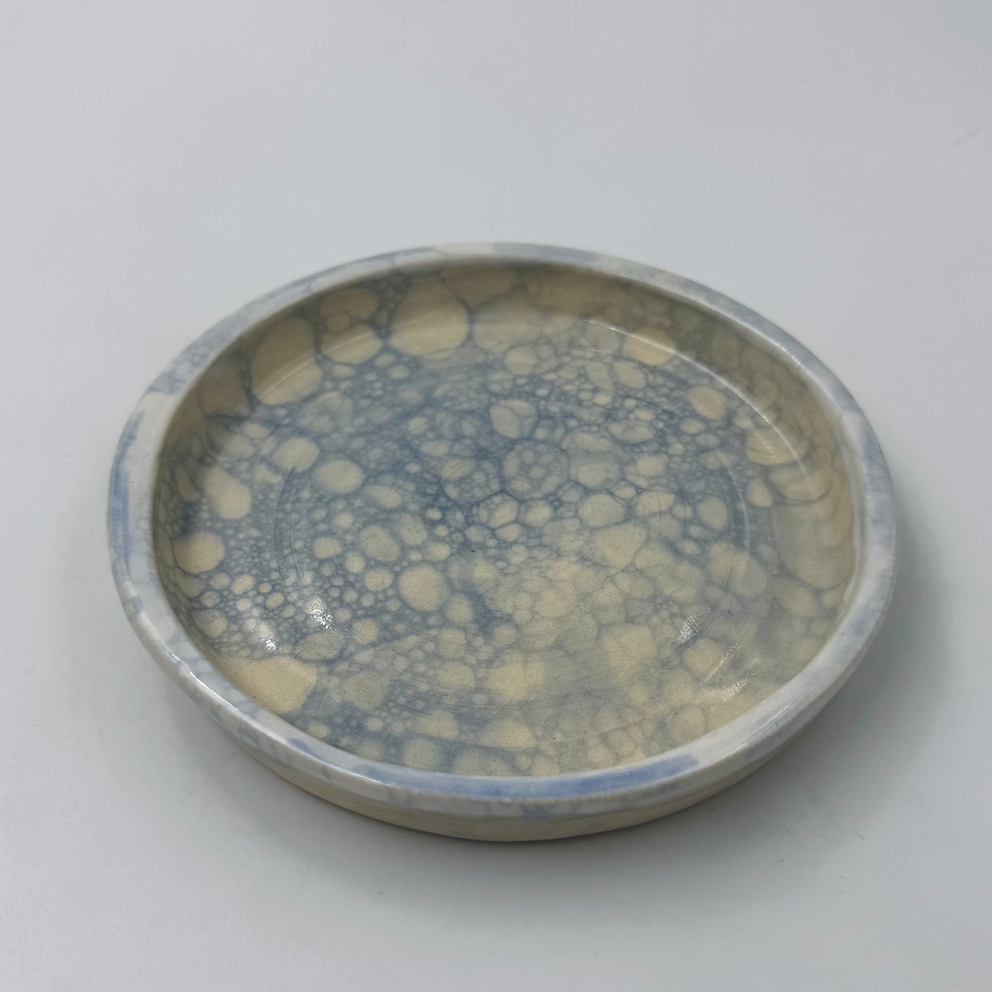 Blue popped bubble plate