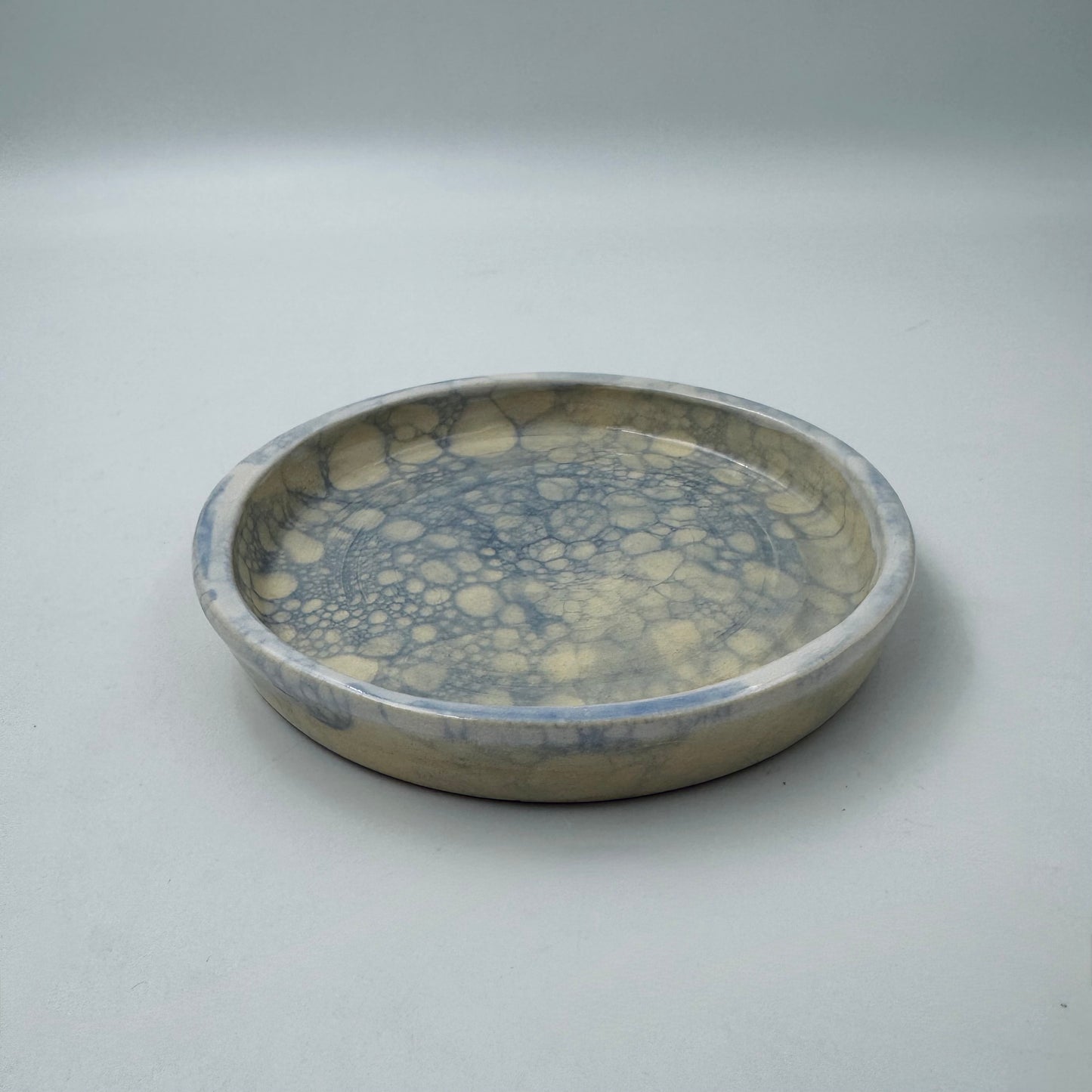 Blue popped bubble plate